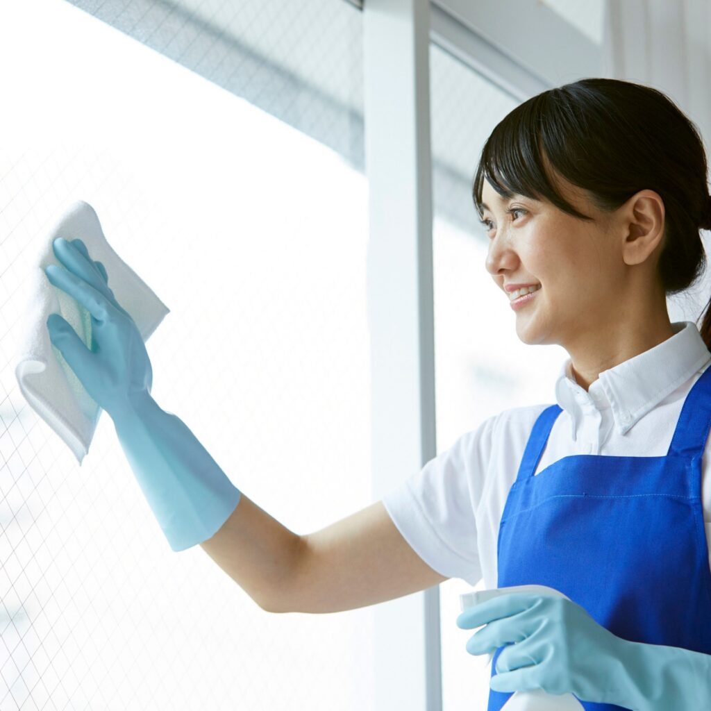 Professional commercial cleaning service team cleaning a modern office workspace in Washington D.C.